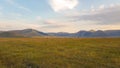 Sunset lights in the natural landscape of the plain of Castelluccio di Norcia. Apennines, Umbria, Italy Royalty Free Stock Photo
