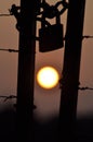 Sunset at the locked gate Royalty Free Stock Photo