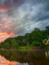 Sunset long the banks of the Amazon river. The tributaries of the Amazon traverse the countries of Guyana, Ecuador, Peru, Brazil, Royalty Free Stock Photo