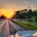 Sunset long road Royalty Free Stock Photo