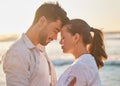 Sunset, love and couple at the beach while on holiday or romantic summer honeymoon in greece. Happy, care and calm man Royalty Free Stock Photo