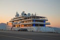 Sunset: Luxury large super or mega motor yacht in the evening. Royalty Free Stock Photo