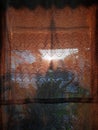 The sunset makes the batik patterned cloth look clear and beautiful