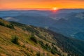 Sunset from Mala Chochula mountain during autumn with orange coloured sky