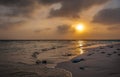 Sunset in the Maldives. Beautiful colorful sunset over the ocean in the Maldives seen from the beach. Amazing sunset and beach