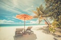 Beautiful beach. Chairs on the sandy beach near the sea. Summer holiday and vacation concept. Inspirational tropical scene. Royalty Free Stock Photo