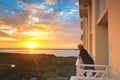 Sunset man hotel balcony Royalty Free Stock Photo