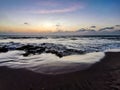 Sunset on Mandrem Beach in Goa, India. Bright and colorful sunset over the Indian Ocean, the Arabian Sea. A tropical Royalty Free Stock Photo