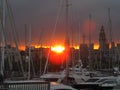 Sunset and many boats and yachts in a port in Barcelona Royalty Free Stock Photo