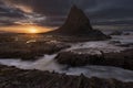 Sunset at Martin`s Beach, with low tide and stormy clouds