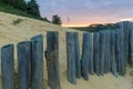 Sunset at the Mechelse Heide with a scenic view of being on the beach with sand and wooden poles