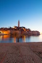 Sunset at medieval town of Rovinj, colorful with houses and church