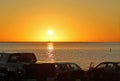 Sunset watchers in their cars Royalty Free Stock Photo