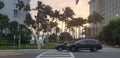 Sunset in Miami With Road, Cars and Stoplight
