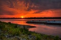 Sunset on the Mississippi River Barges Traveling the waterway Royalty Free Stock Photo