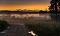 Sunset and mist in a countryside Royalty Free Stock Photo