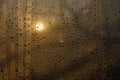 Sunset through misted glass with drops and drips Royalty Free Stock Photo