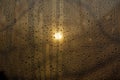 Sunset through misted glass with drops and drips Royalty Free Stock Photo