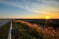Sunset moment at side road Royalty Free Stock Photo