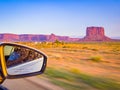 Sunset on Monument Valley from the car, Arizona Utah border Royalty Free Stock Photo