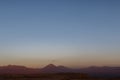 Sunset at the Moon Valley Valle de la Luna with the Licancabur volcano, Atacama, Chile Royalty Free Stock Photo