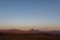 Sunset at the Moon Valley Valle de la Luna with the Licancabur volcano, Atacama, Chile Royalty Free Stock Photo