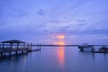 Sunset and moonrise over Masonboro Inlet Wrightsville Beach NC Royalty Free Stock Photo