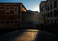 Sunset on the most beautiful canal of Venice. Shadows on the bridge. Italy Royalty Free Stock Photo