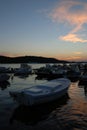 Sunset and motor boats in Mali Losinj harbour,Croatia