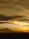 Sunset beside a mountain