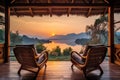 sunset mountains lake wooden patio with two armchairs, relax in outdoor and nature concept