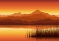Sunset in mountains near lake