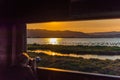 Sunset at the mouth of the Ebro Delta and wetlands, Tarragona, Catalonia, Spain. Copy space for text.