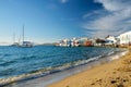 Sunset in Mykonos, Greece, with cruise ship and yachts in the harbor Royalty Free Stock Photo