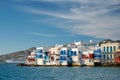 Sunset in Mykonos, Greece, with cruise ship and yachts in the harbor Royalty Free Stock Photo