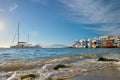 Sunset in Mykonos, Greece, with cruise ship and yachts in the harbor Royalty Free Stock Photo