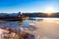 Sunset with mystical atmosphere at the winterly snowy Edersee in Germany