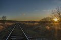 Sunset near Ceske Budejovice city in winter with railway Royalty Free Stock Photo