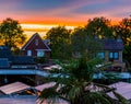 Sunset in a neighborhood of Rucphen, the Netherlands, small Rustic village scenery, Dutch architecture