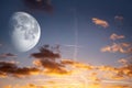 Sunset and new moon Royalty Free Stock Photo