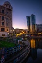 Modern and historic buildings on the Danube Canal in Vienna