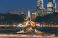 Sunset and night view of the Philadelphia cityscape and skyline from the Benjamin Franklin Avenue