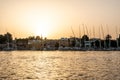 Sunset Nile Aswan the West Bank with small village houses with fishing sailing boats felucca Royalty Free Stock Photo