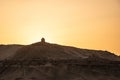 Sunset Nile Aswan and the West Bank with Tombs Old Kingdom Qubbet el-Hawa - `Dome of the Winds` at the crest of the hill Royalty Free Stock Photo