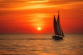 Sunset on the ocean with sailing yachts on the horizon Royalty Free Stock Photo