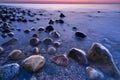 Sunset ocean stones. Baltic Sea coast, Poland.