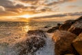 Sunset Ocean Wave Breaking Rocks Royalty Free Stock Photo