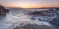 Sunset off the South Wales coast. Ogmore-by-Sea is a popular destination to swim and surf.