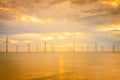 Sunset Offshore Wind Turbine in a Wind farm under construction o Royalty Free Stock Photo