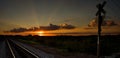 Sunset in Ohio at a railroad crossing